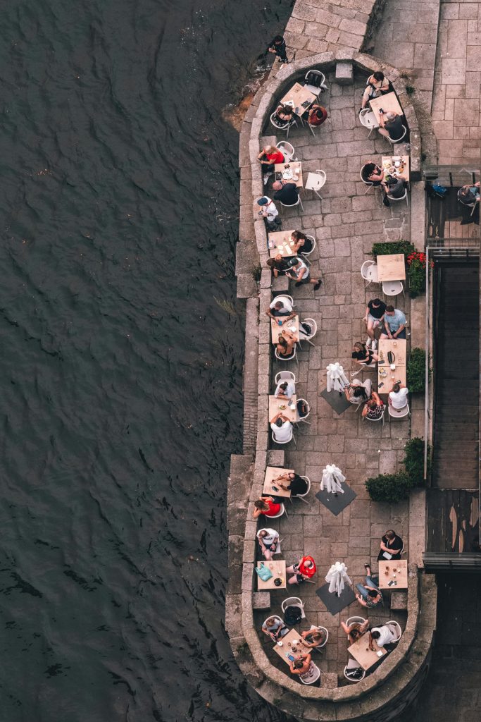 People eating and drink in Porto near river
