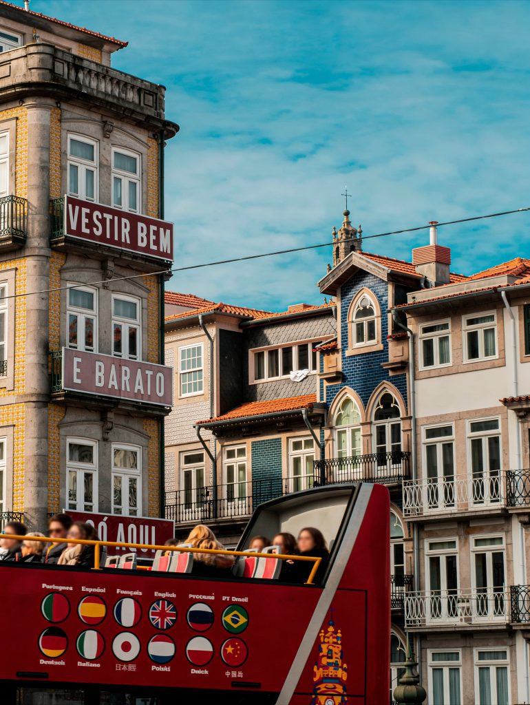 Sightseeing bus in Porto. What languages are spoken in Portugal
