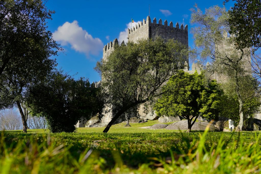 Guimarães Castle surrounded by green trees